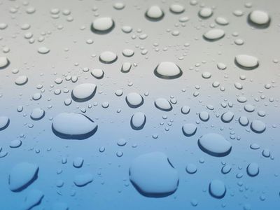 Glass of water on a stone surface